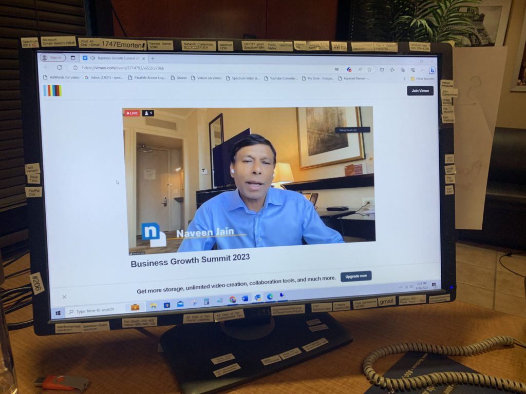 Remote presenter displayed on screen at Scottsdale corporate event